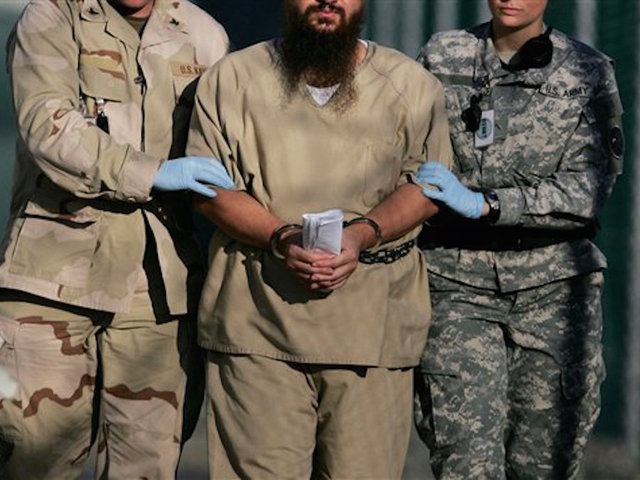 Obama shrinks Guantanamo population