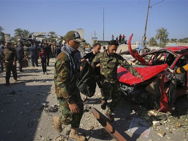 Suicide bomber kills more than a dozen in Iraq
