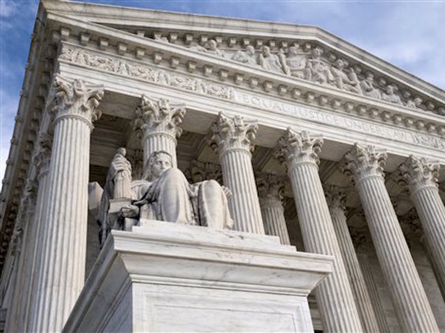 Court upholds total population in districts