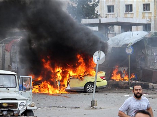 IS claims deadly blasts in 2 Syrian cities