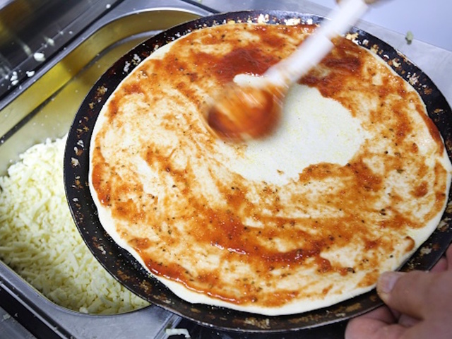 Ohio man tries to retrieve pizza rolls, roommate brandishes sword