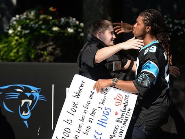 Charlotte tries to return to normal, lifts curfew