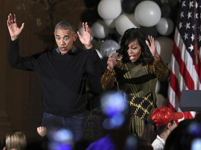 Obamas hand out treats at the White House for Halloween