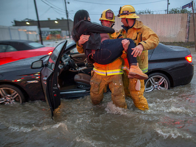 Floods swallow California as severe storms kill three