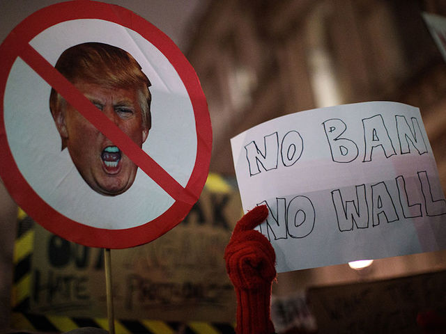 Judge in Hawaii puts revised federal travel ban on hold