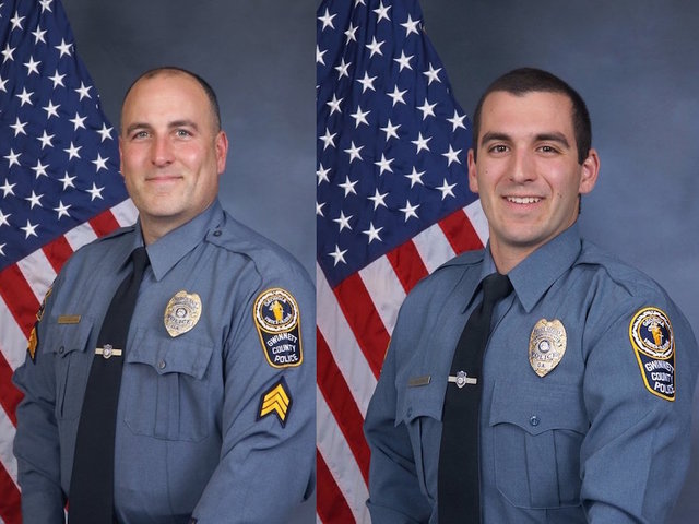 Cops fired after videos surface of them punching and kicking motorist