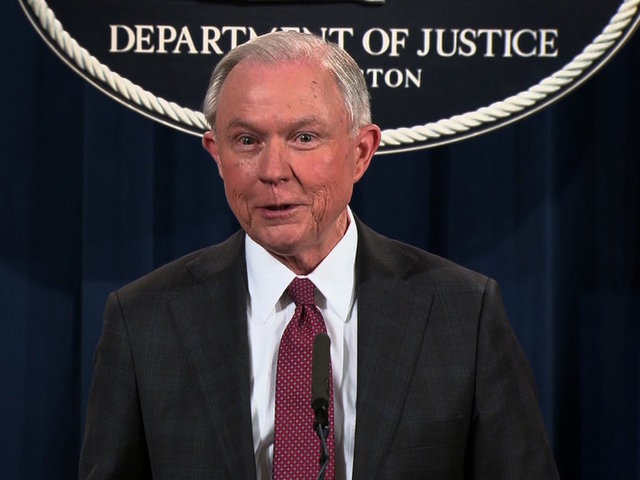Activist convicted of laughing at Jeff Sessions during hearing; faces year in prison
