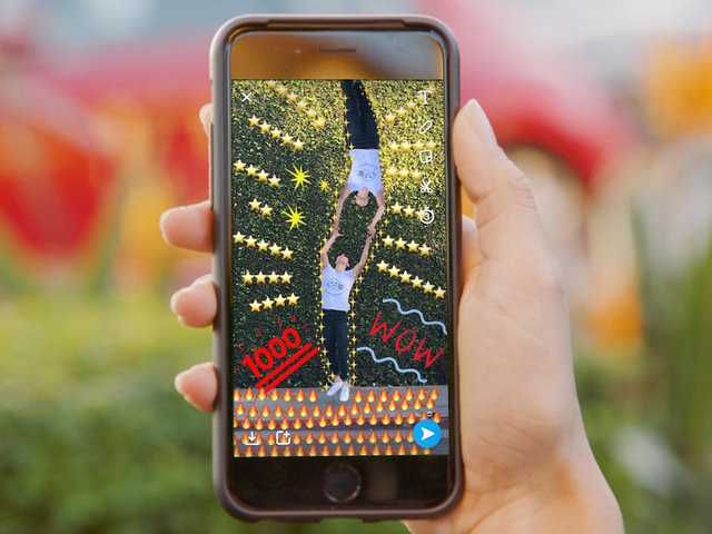Snapchat battles Facebook, unveils custom Stories