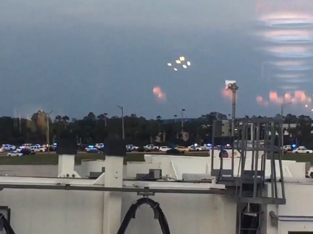Man with gun at Orlando airport taken into custody after standoff