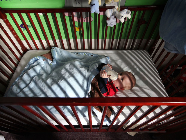 Babies may sleep longer in their own rooms, study says