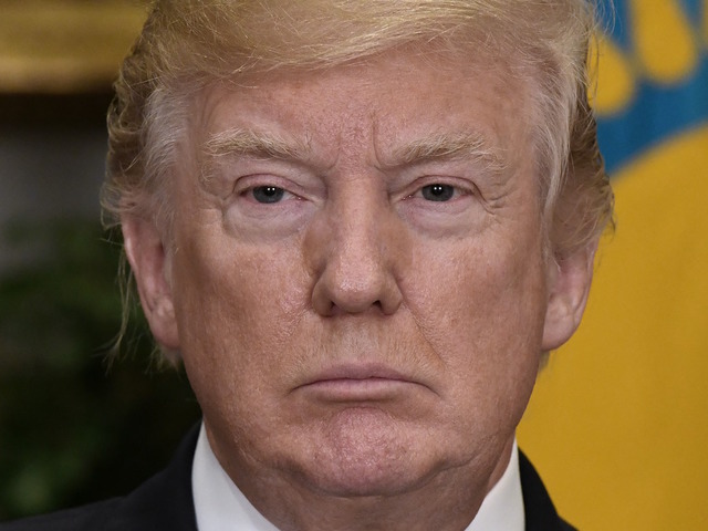 Trump says he would apologize for retweeting far-right British group