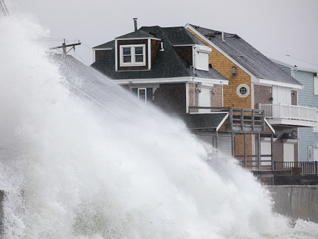 'Bomb cyclone' pounds east coast with heavy flooding, high winds