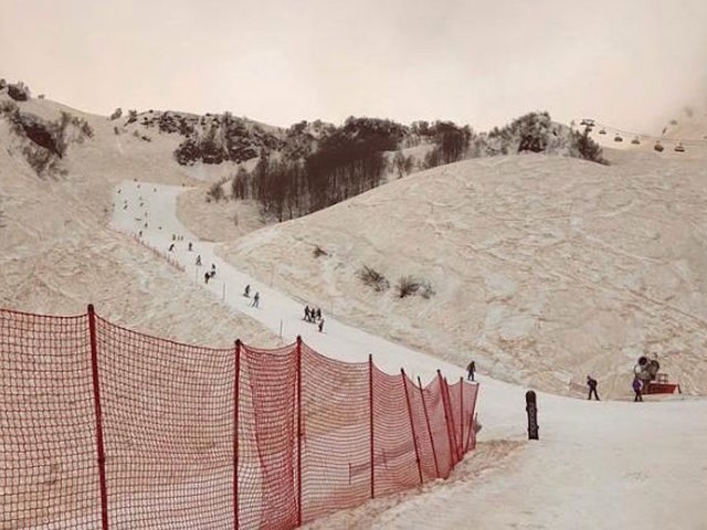 Orange snow blankets parts of Russia
