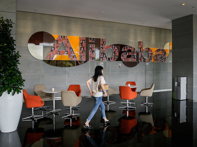 China's biggest e-commerce company, Alibaba, spends billions on online food delivery service