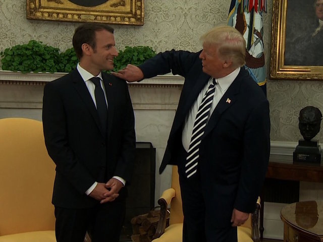 Trump brushes off French president's 'dandruff'