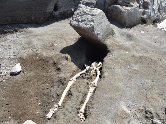 Archaeologists uncover remains of man crushed as he fled Pompeii