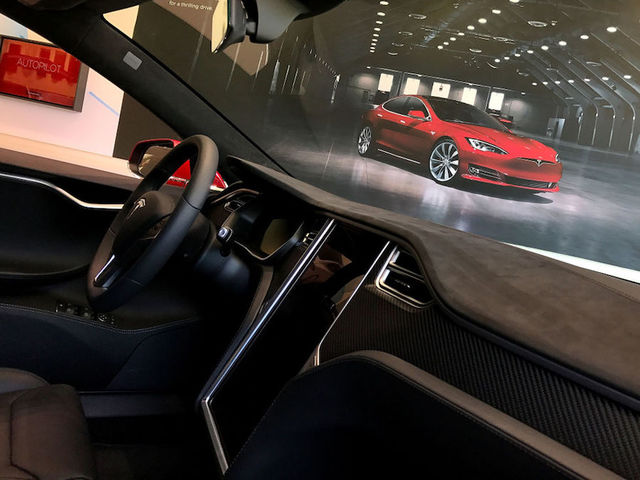 Tesla spontaneously catches fire with no crash
