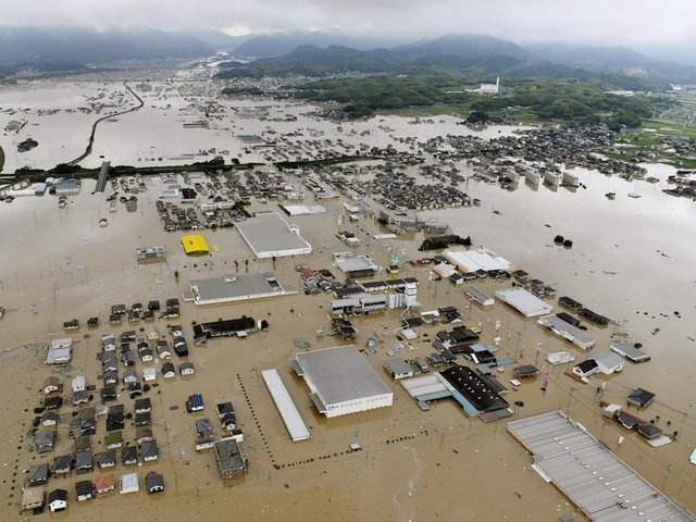 Flooding and landslides in Japan leave at least 85 dead