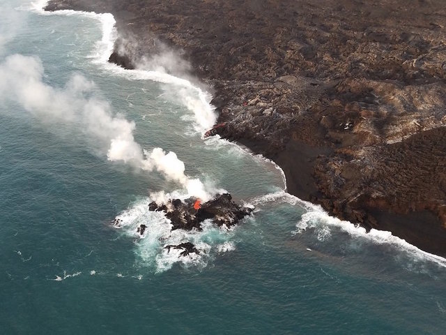Lava from the Hawaii volcano has created a tiny new island off its coast