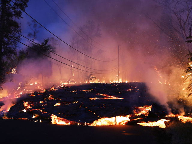 Hurricane Hector is headed toward Hawaii, where a volcano is erupting