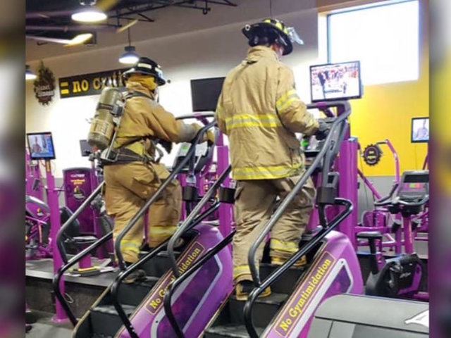 Firefighters in full gear walked up 110 flights of stairs to honor those who died on 9/11