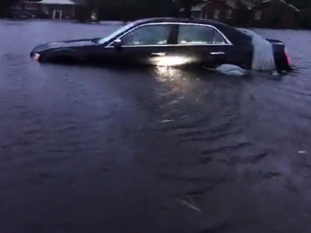 Scores of people in New Bern, North Carolina, have been rescued from the water